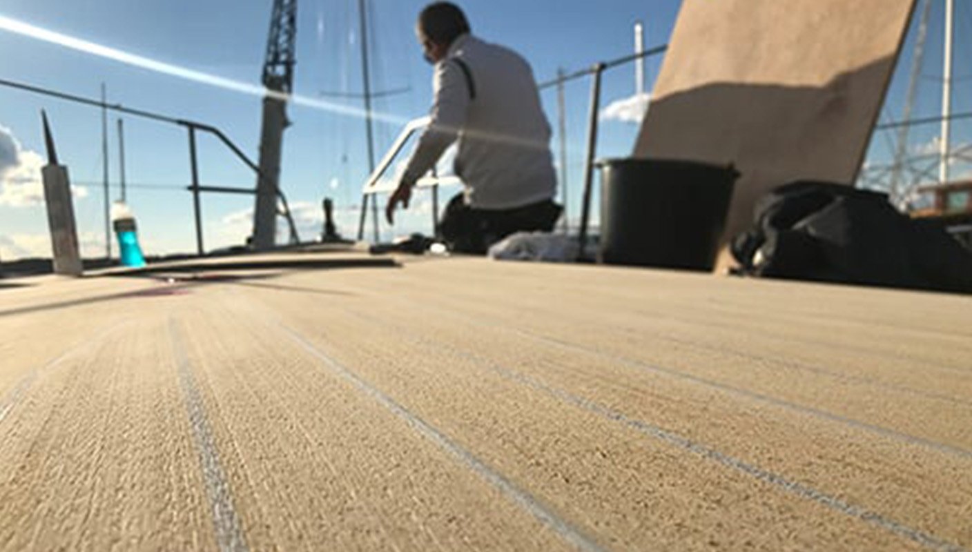 Flexiteek synthetic deck being cleaned