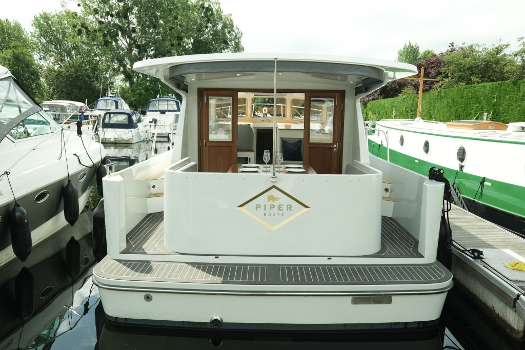 Piper Boats Motor River Cruiser 12C fitted with Flexiteek 2G Charcoal with White caulking